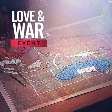 A Marine looks at a picture of his loved one as a strategic map is rolled out on the table in front of him